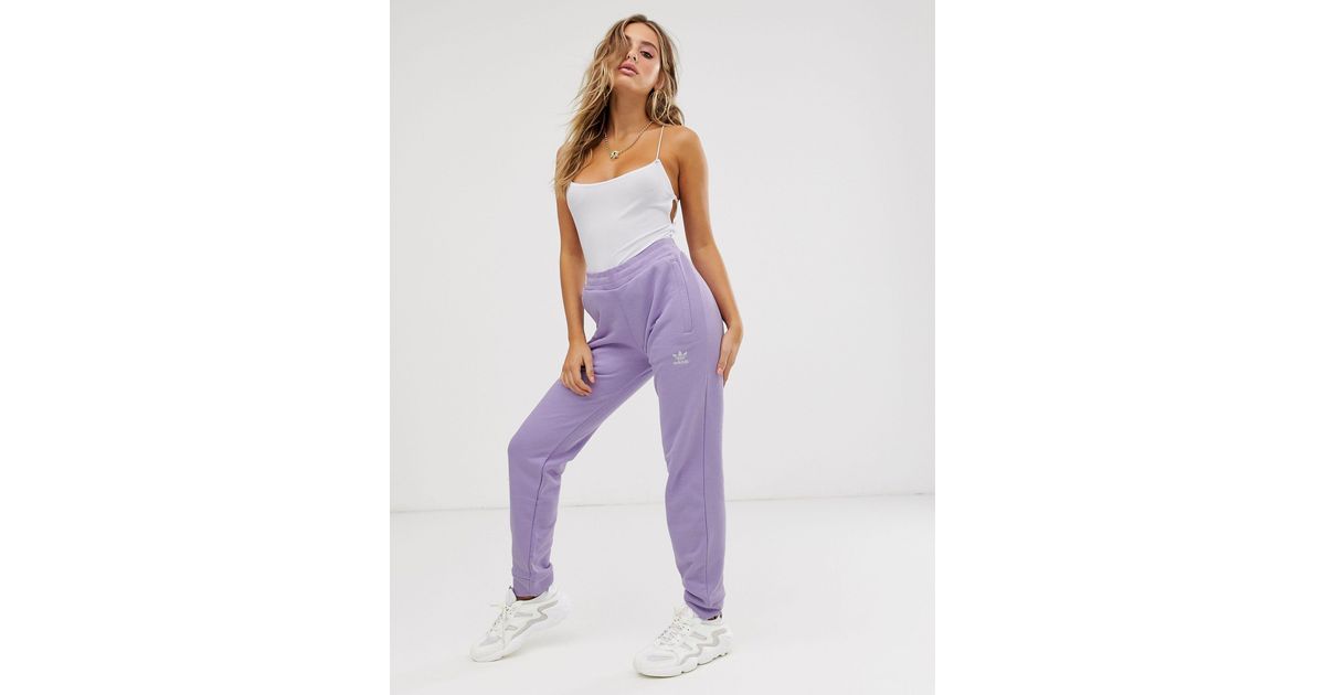 pantaloni adidas lilla