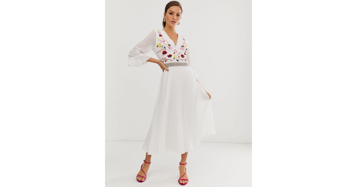 white pleated midi dress