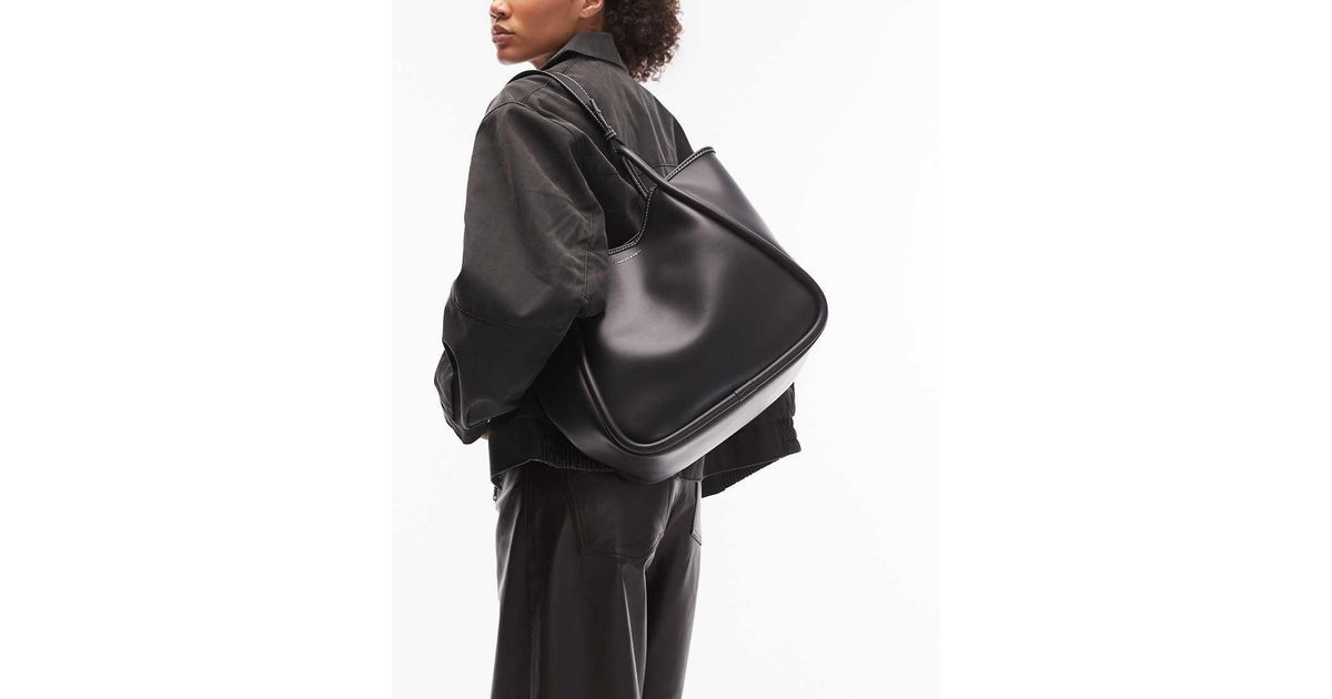 Charles Keith Lyla Tubular Slouchy Tote Bag In Black Lyst UK charles-keith-lyla-tubular-slouchy-tote-bag-in-black-lyst-uk