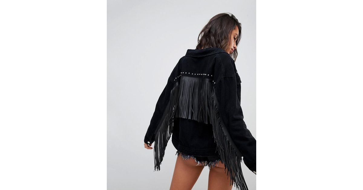 black denim jacket with tassels