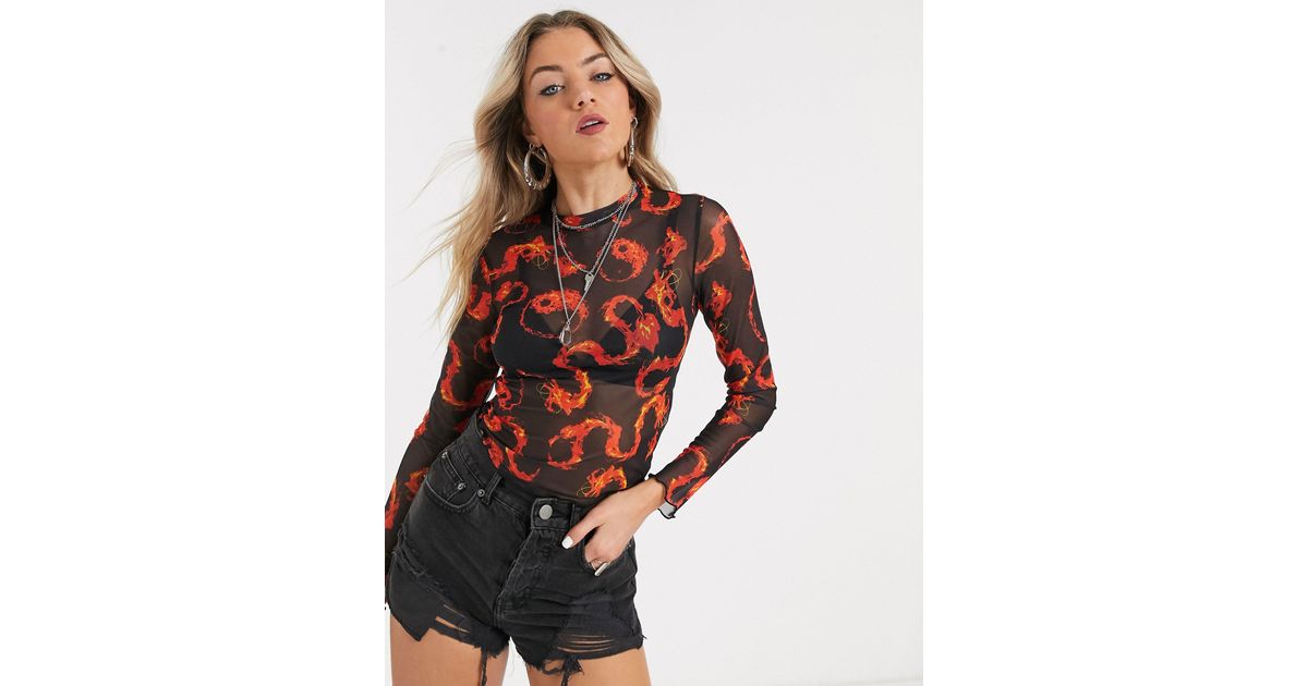 Top a maniche lunghe trasparente con fiamme e Yin-YangBershka in Materiale  sintetico di colore Nero | Lyst