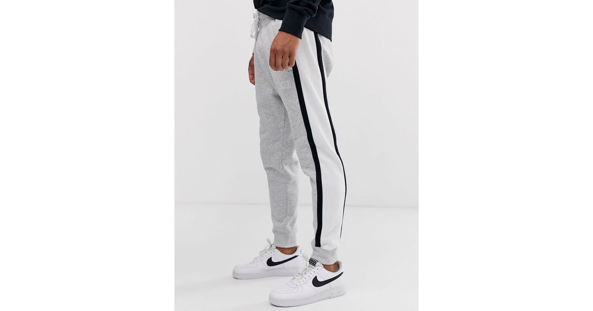 grey nike sweatpants black stripe