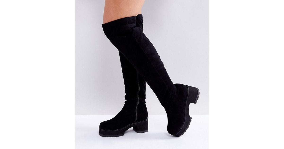 black chunky over the knee boots