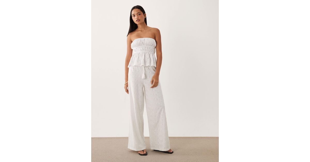 712 Asos ASOS Wide Leg Drawstring Tassel Detail Jersey Eyelet Pants in White | Lyst