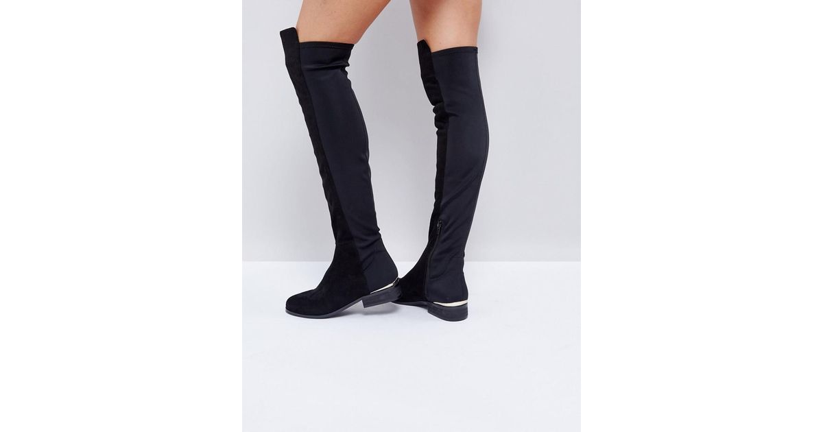 stretch over the knee black boots