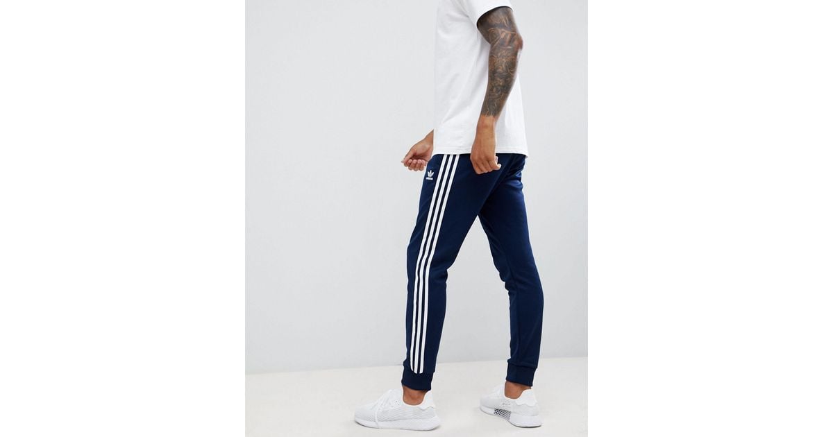 adidas Originals Three Stripe Skinny Sweatpants With Cuffed Hem in Navy  (Blue) for Men | Lyst