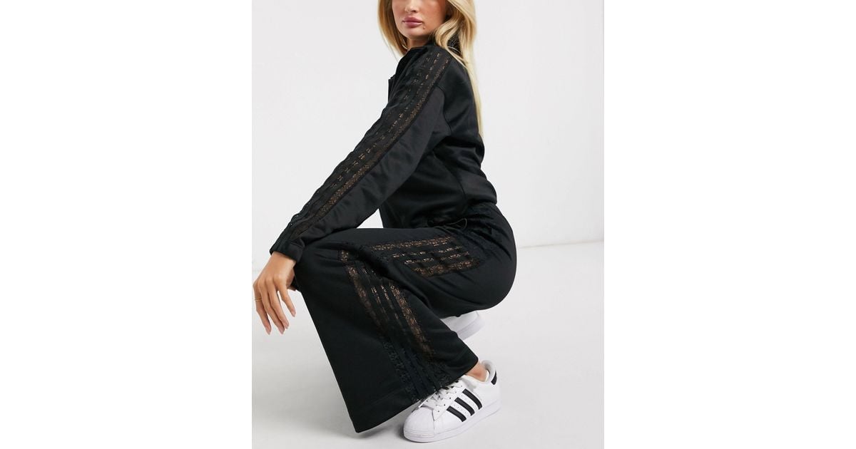 adidas originals bellista lace insert wide leg trousers in black