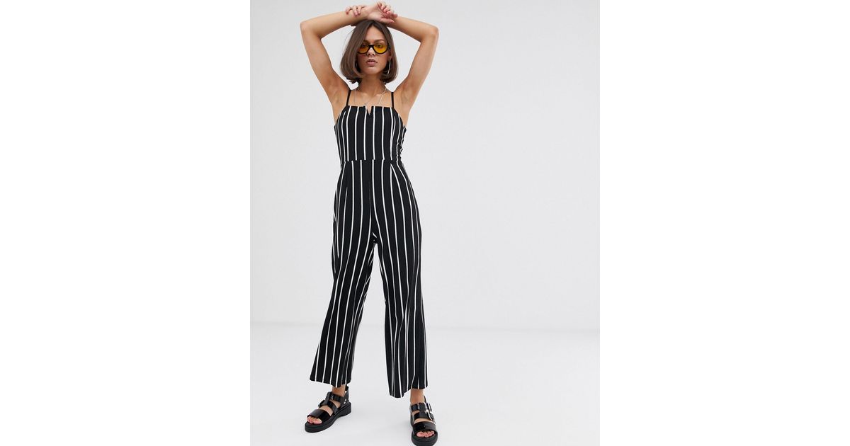 Tuta jumpsuit nera con intaglio sul davantiBershka in Denim di colore Nero  | Lyst