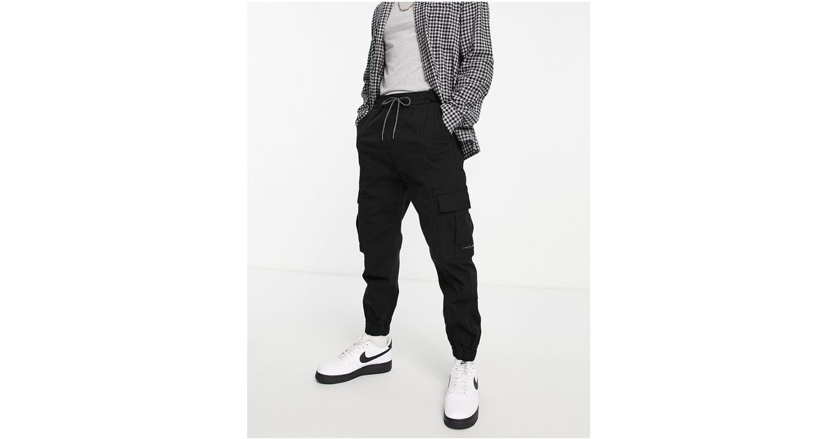 Bershka belted utility store trouser in black
