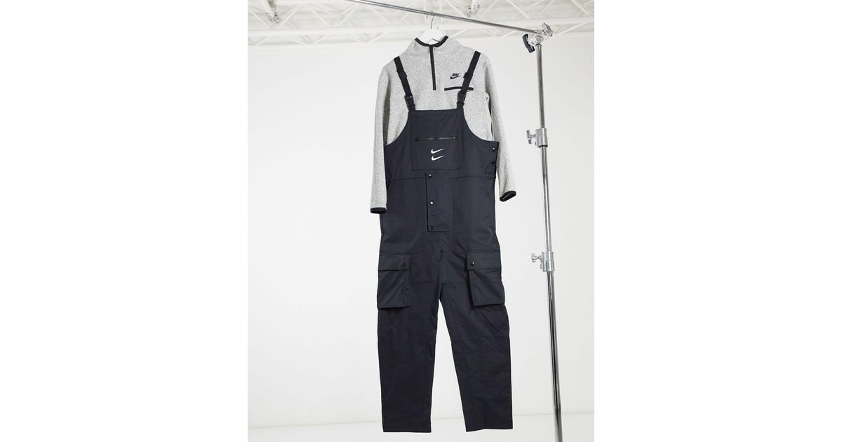 nike swoosh woven dungarees in black