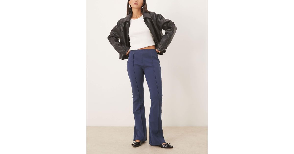 Mid Buff Color Interlock ASOS Mid Rise Skinny Flare Interlock Pants in Blue | Lyst