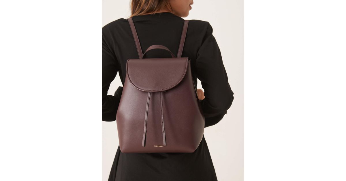 Calvin Klein Foil Logo Backpack in Brown | Lyst