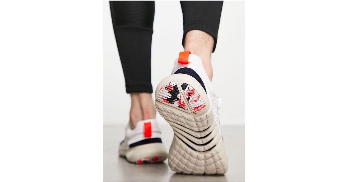 Nike free rn uomo bianche sale