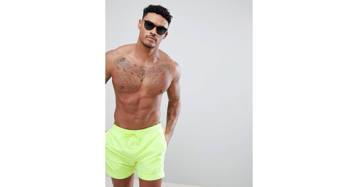 neon swimming shorts
