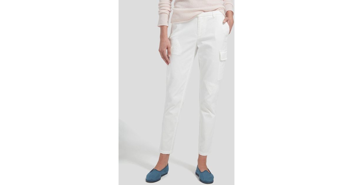 white ripped cargo pants