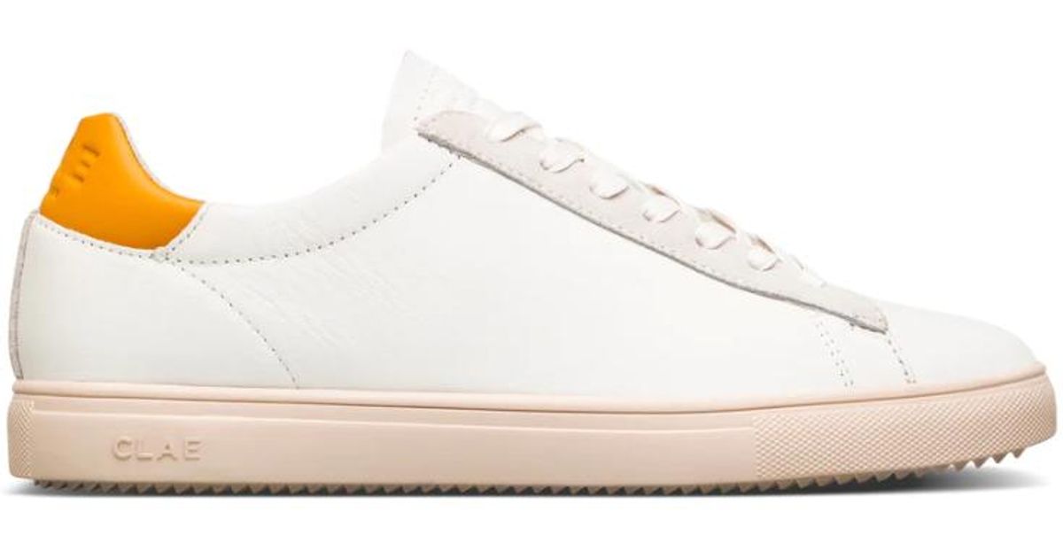clae bradley triple white leather