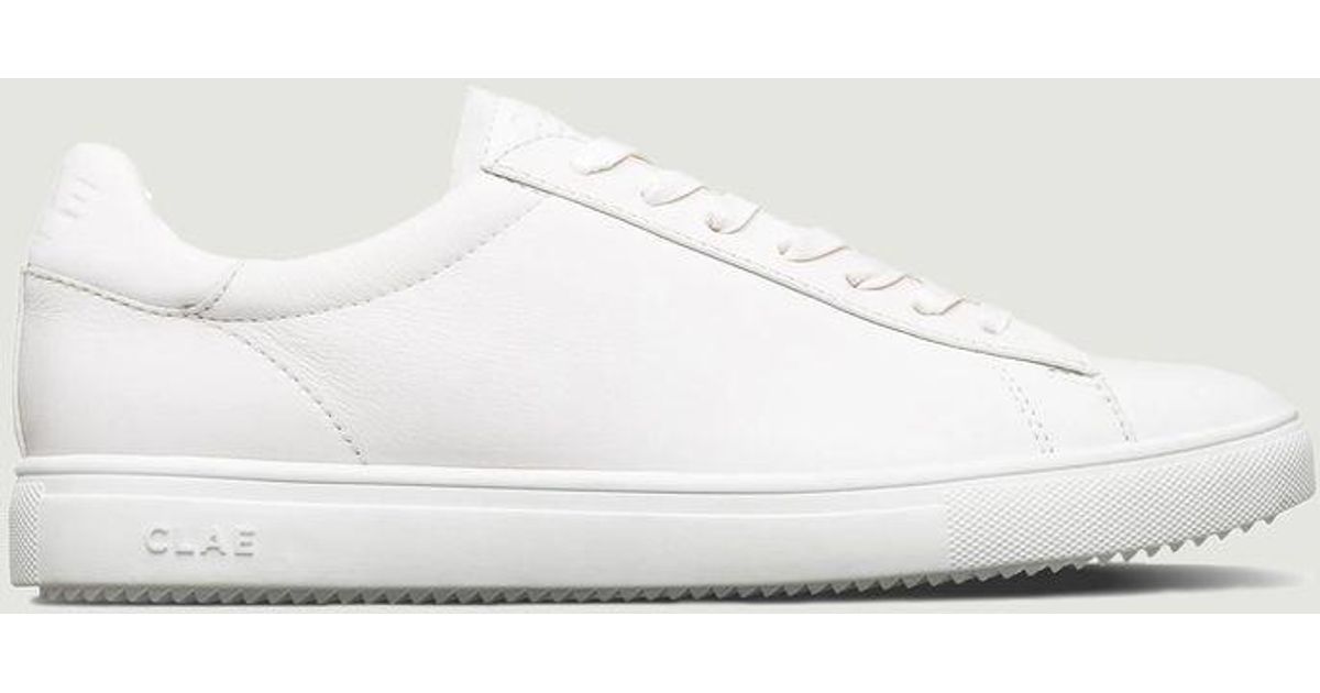 clae bradley triple white leather