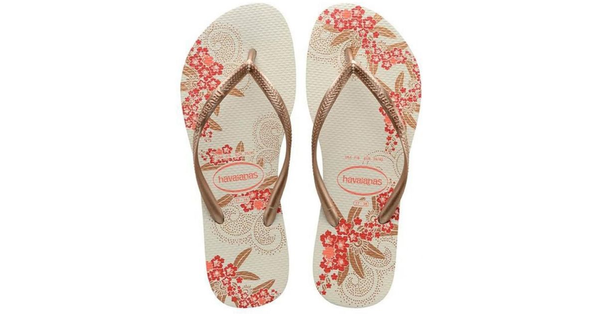 gold and white havaianas