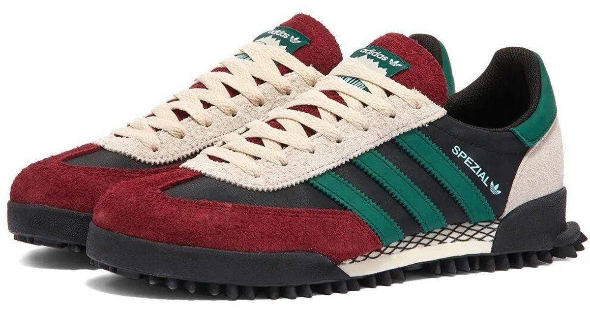 adidas black and green trainers