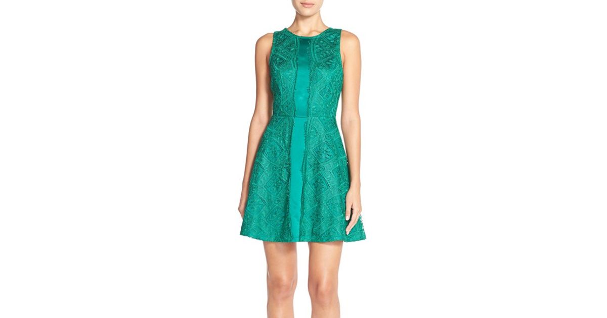 green lace fit and flare dress