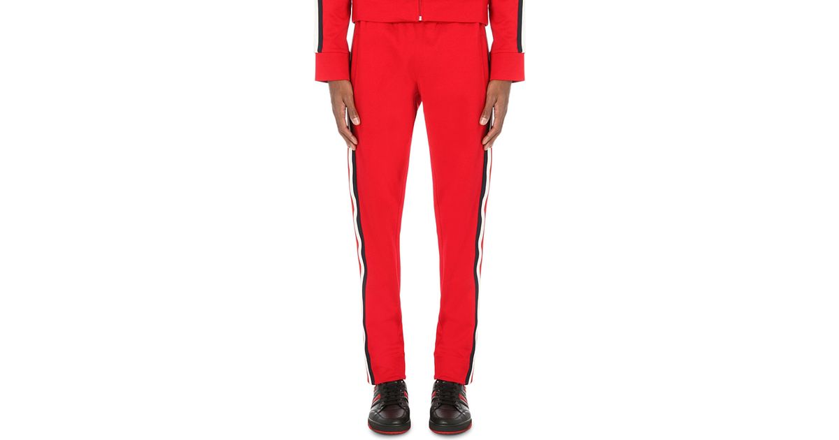 red jogging bottoms