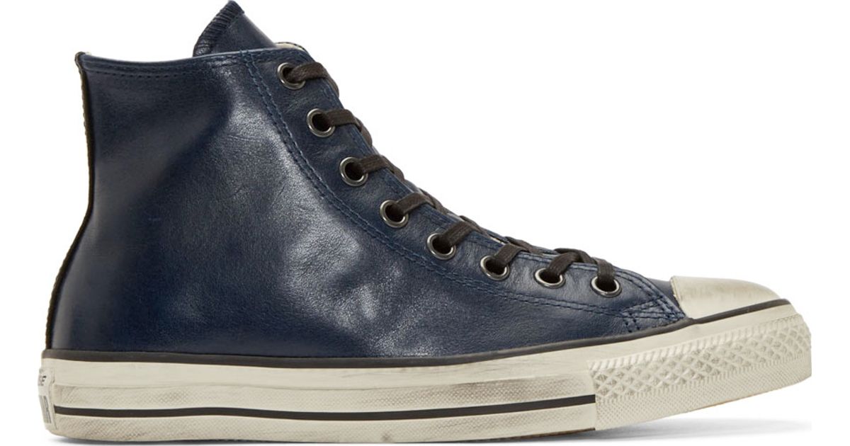 converse navy leather high tops