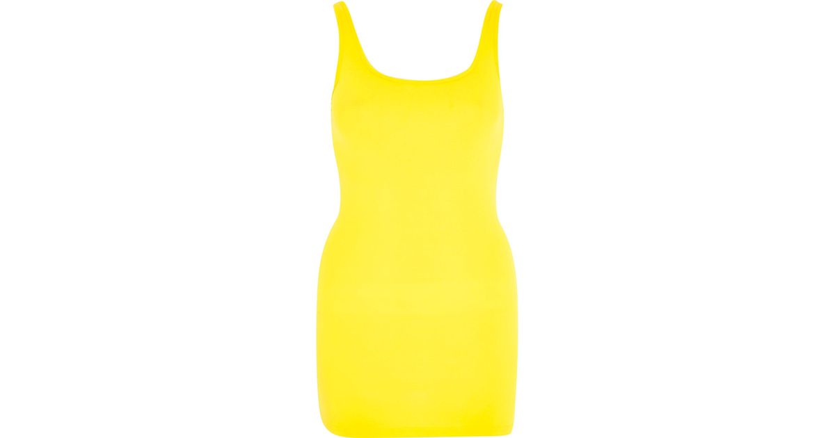 bright yellow vest top