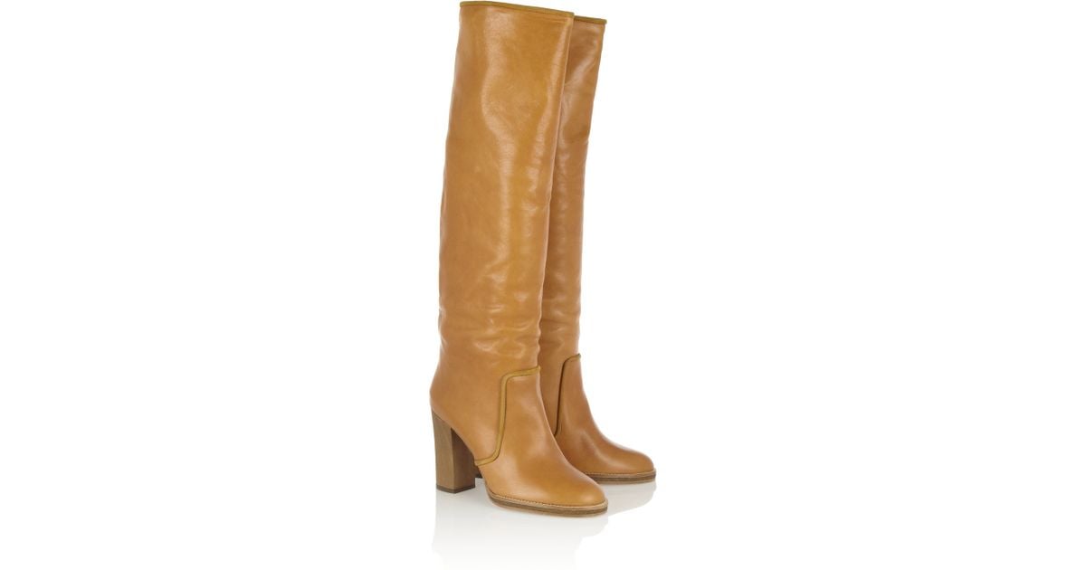 knee length tan leather boots