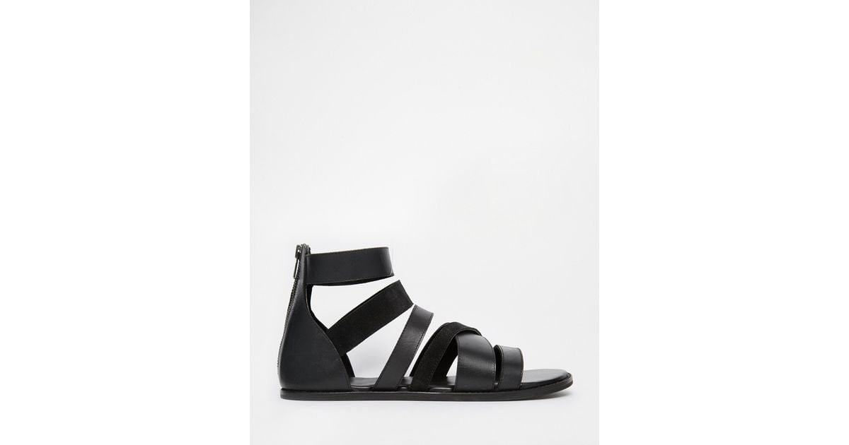 asos design gladiator sandals in black leather with chunky sole