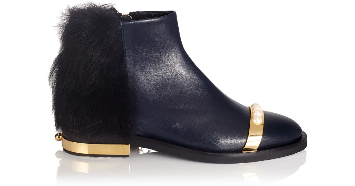 navy blue boots with fur