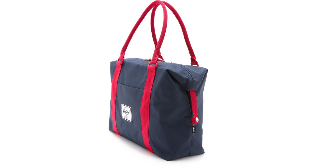 navy and red bag