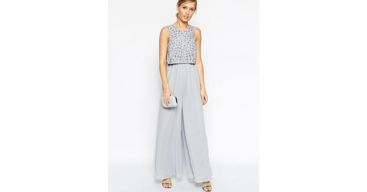 overlay embellished split neck black jumpsuit