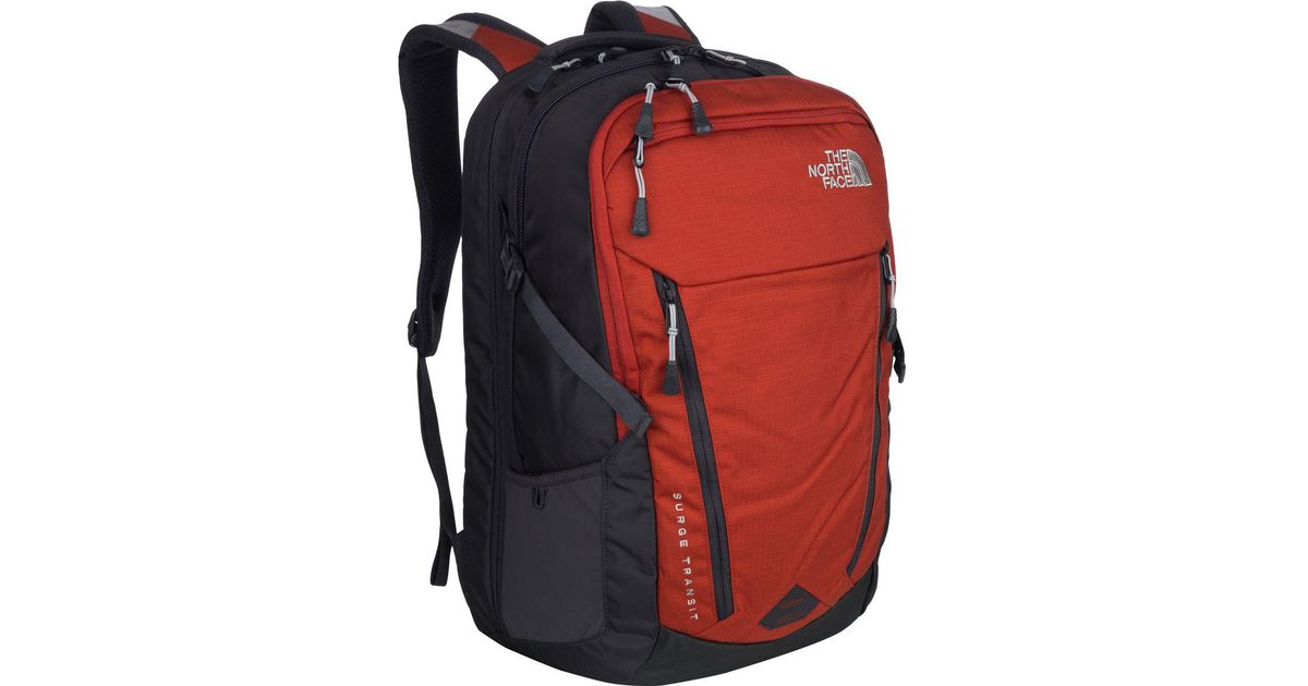 The North Face Surge Transit 38l Backpack in Red | Lyst