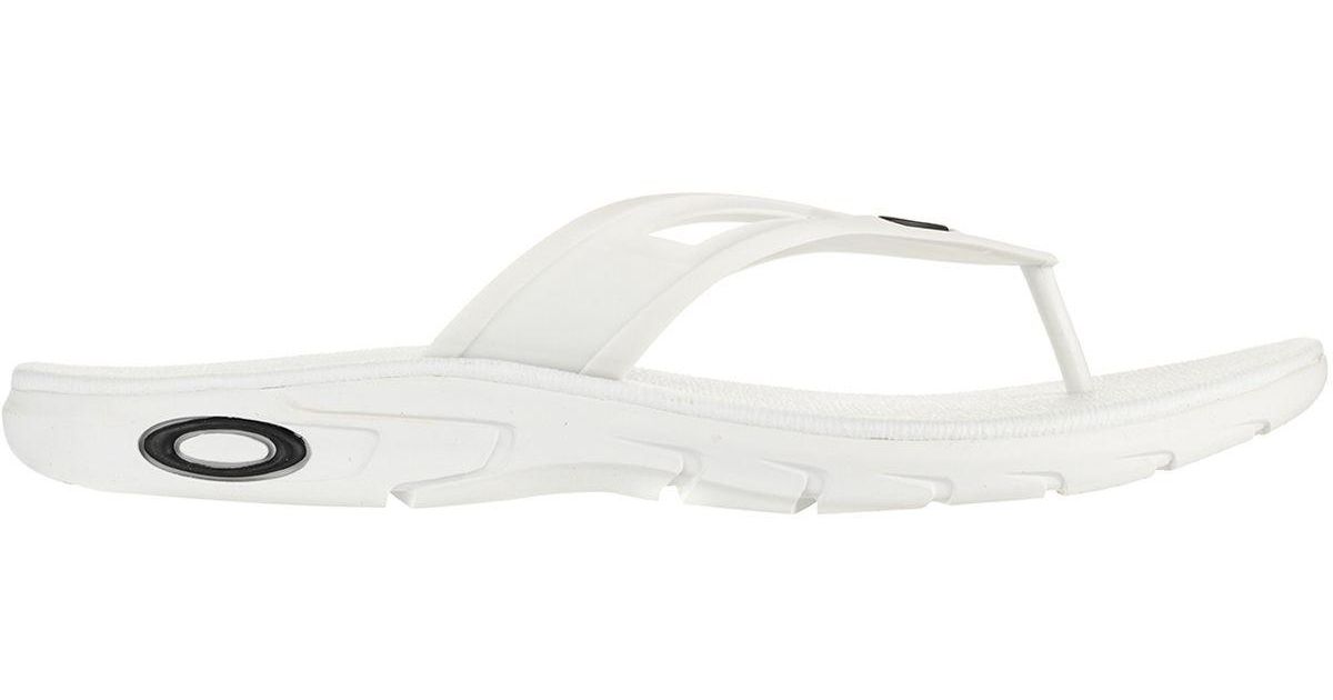 white oakley flip flops