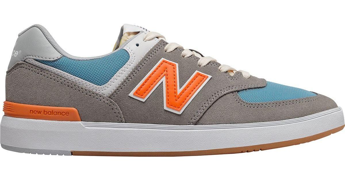 new balance 574 orange grey