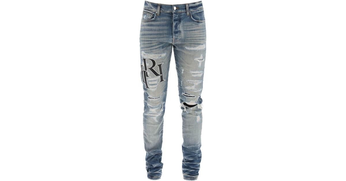 Amiri Destroyed Jeans With Staggered Logo in Blue for Men | Lyst Amiri Destroyed Jeans With Staggered Logo in Blue for Men | Lyst