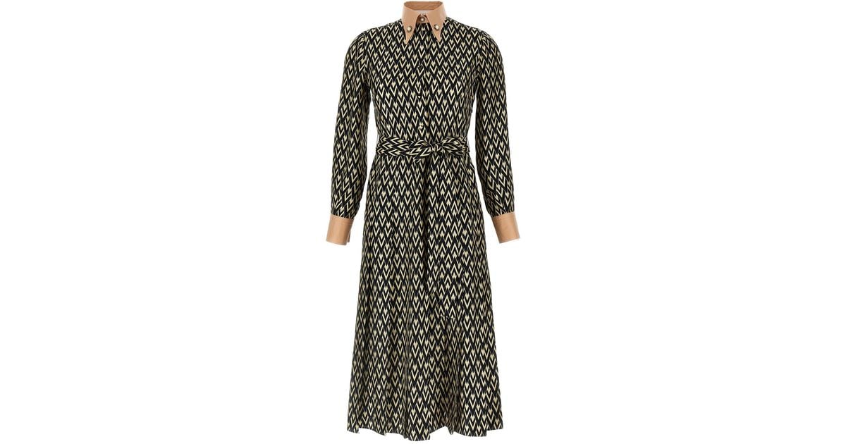 スカート VALENTINO Valentino Garavani 'Toute La V' midi dress Valentino Garavani Toute La V-print Midi Dress | Yellow
