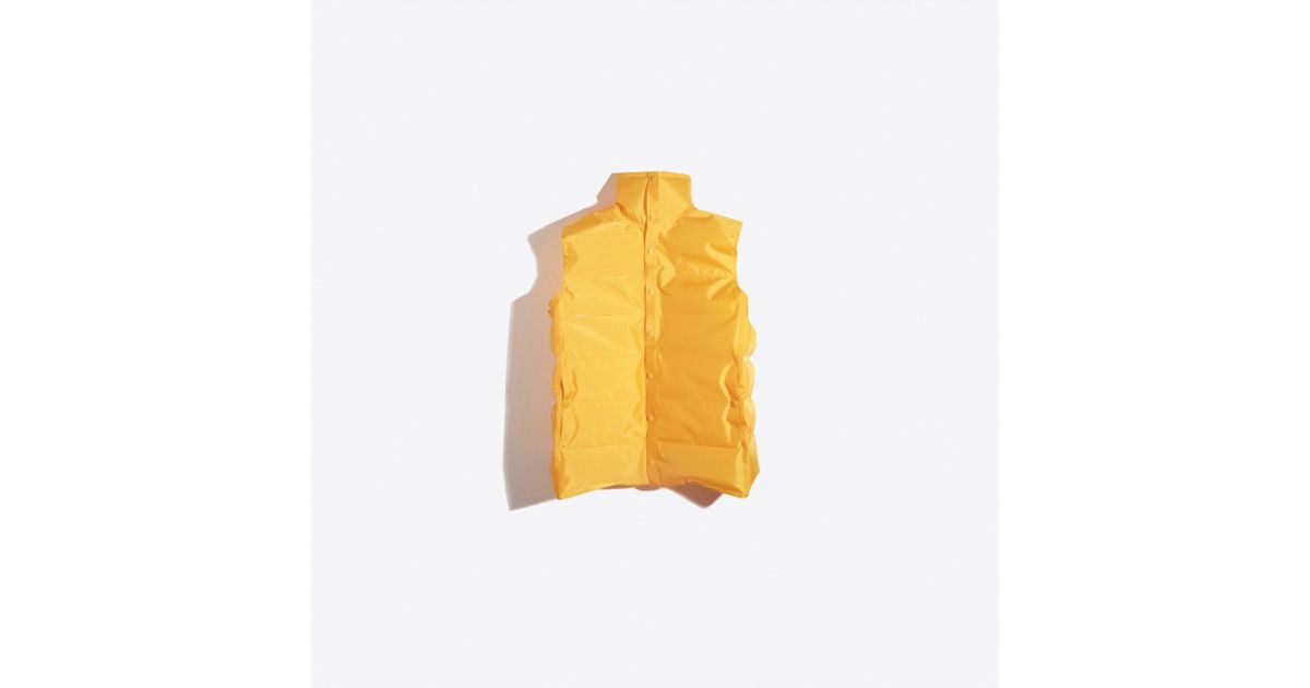Balenciaga High-neck inflatable gilet (€2.405) ❤ liked on Polyvore  featuring outerwear, vests, yellow, high neck vest, balencia…