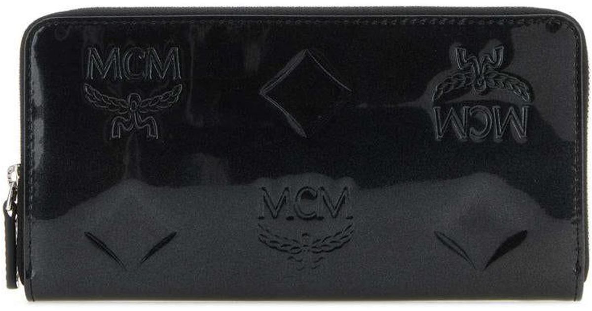MCM Wallets in Black | Lyst