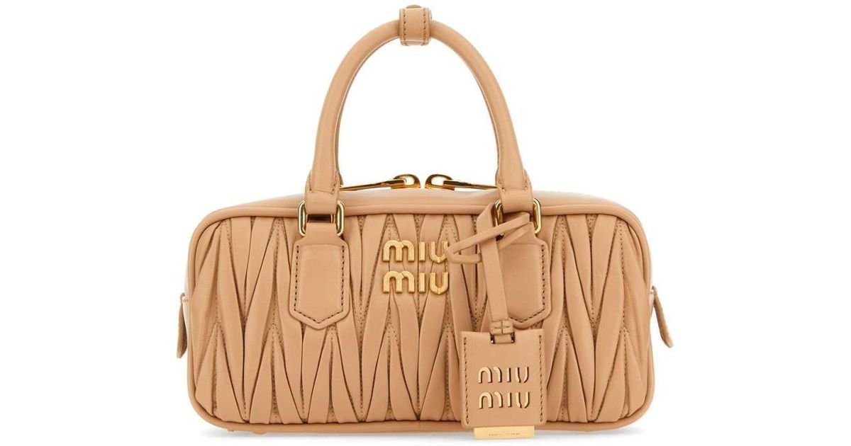 Miu Miu Handbags. in Natural Lyst