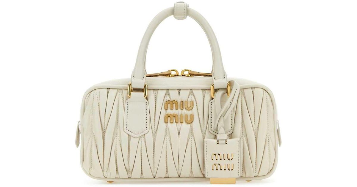 Miu Miu Handbags. in Metallic Lyst