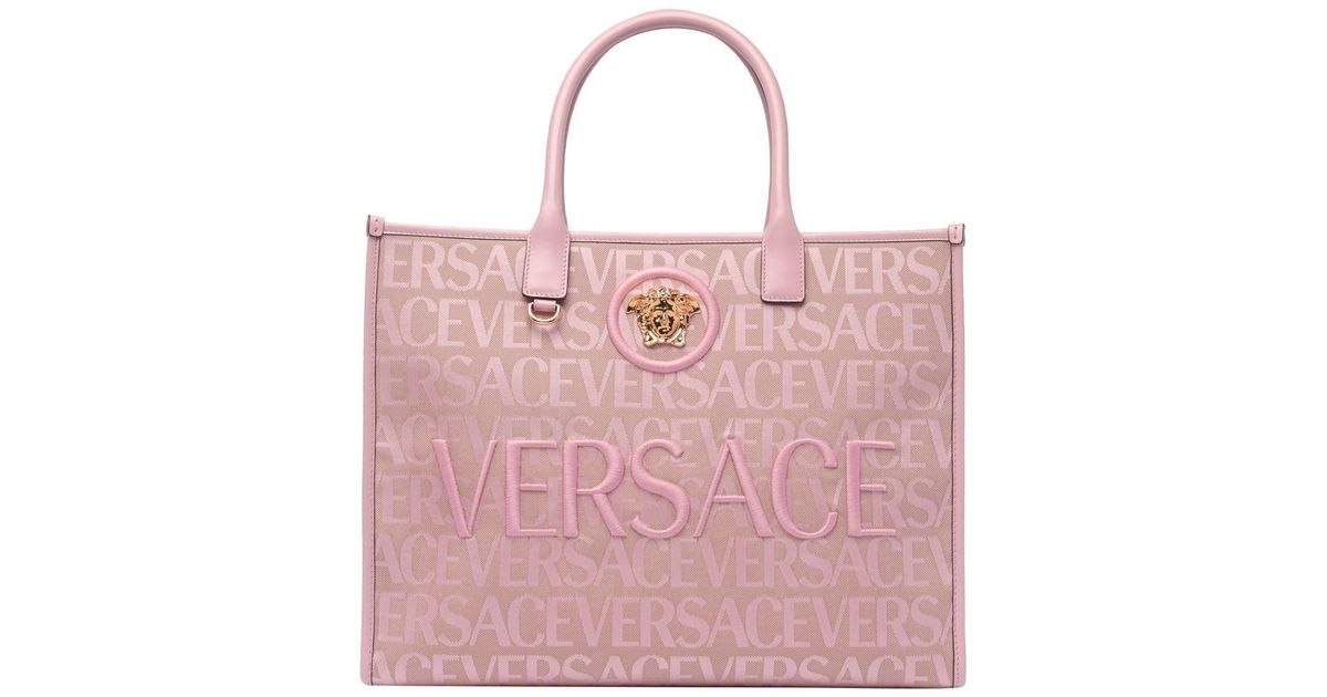 Versace Bags in Pink | Lyst