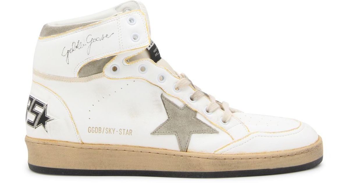 in style white sneakers
