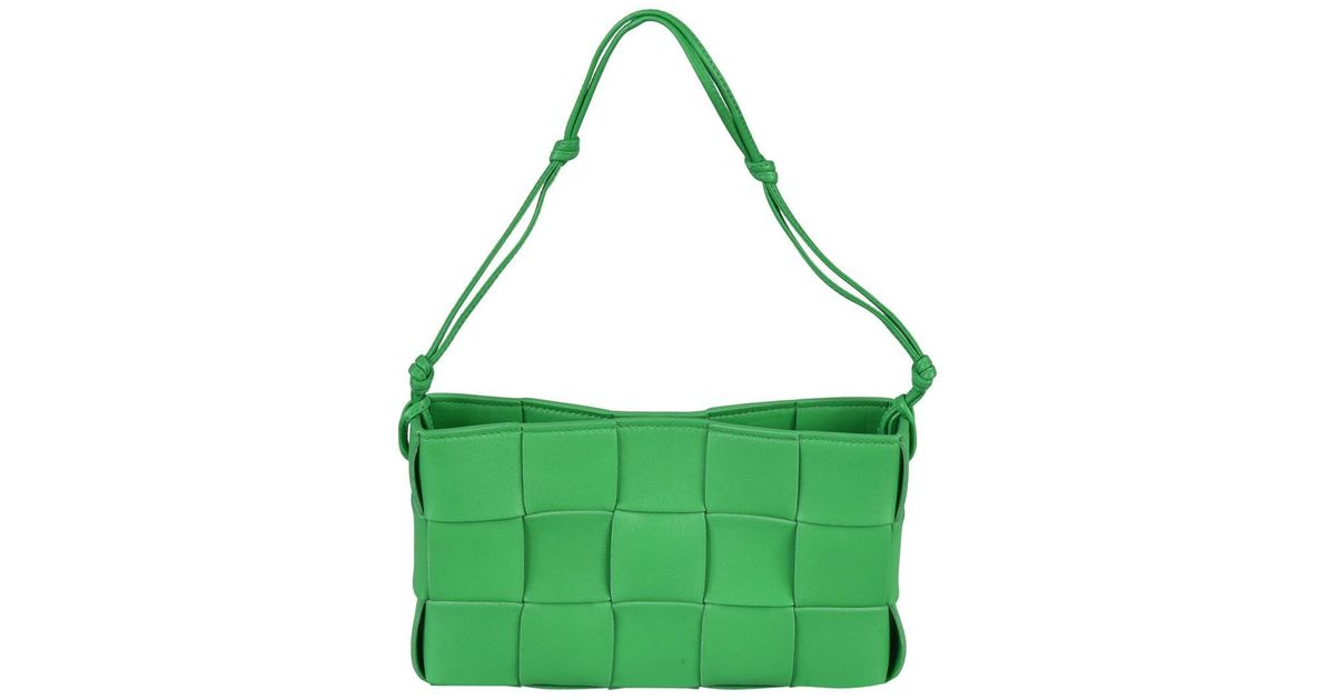 green hand bags