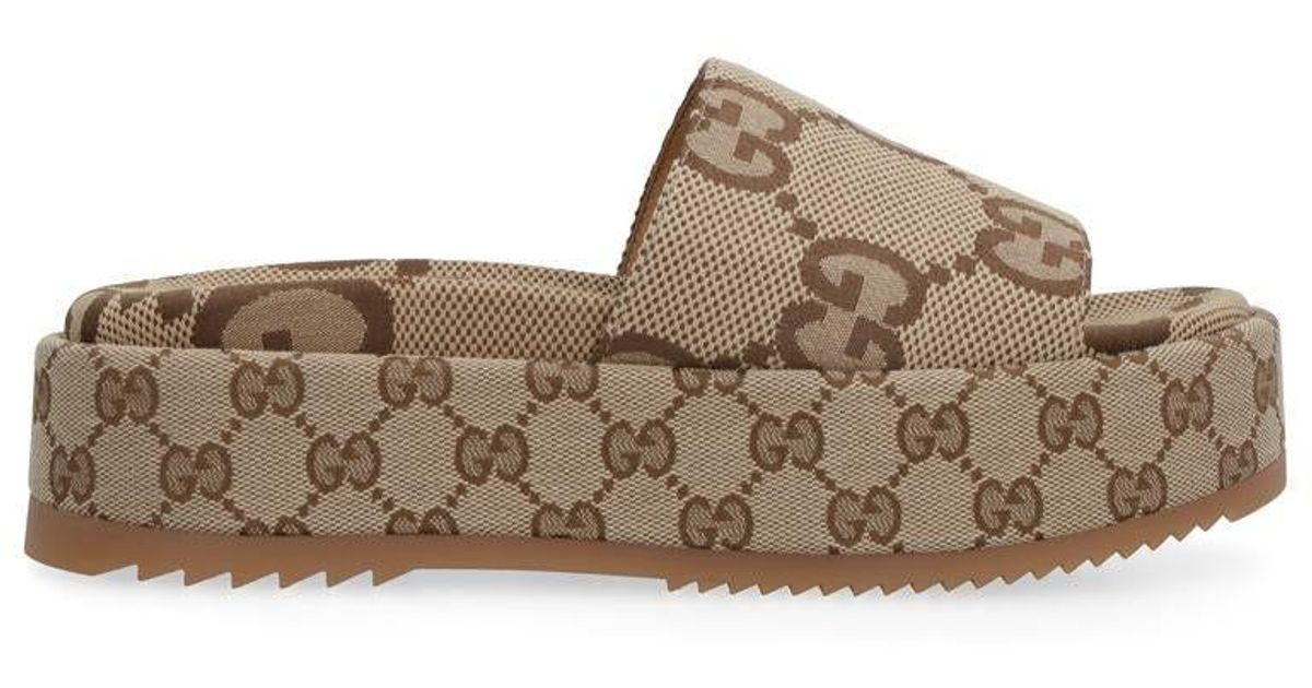 Gucci Platform Slides in Brown Lyst