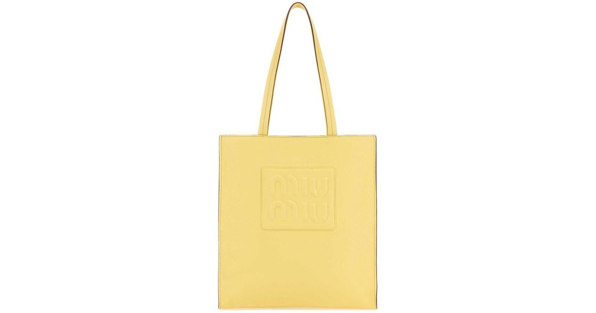 Miu Miu Handbags. in Yellow Lyst