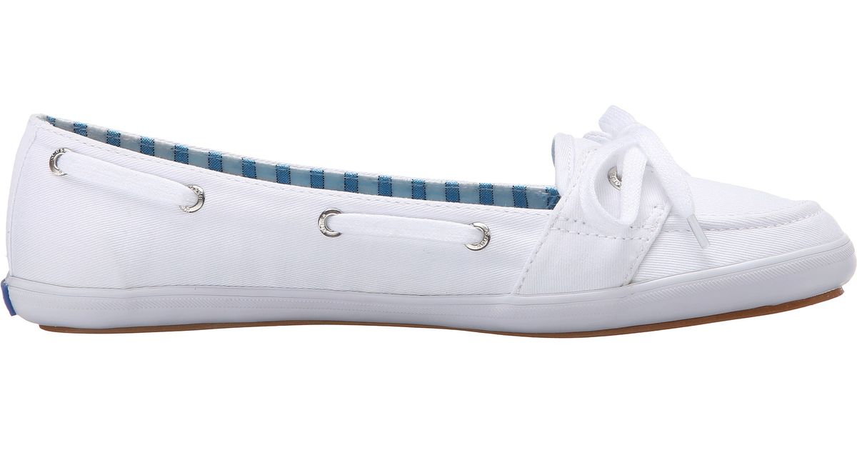 keds boat shoes white