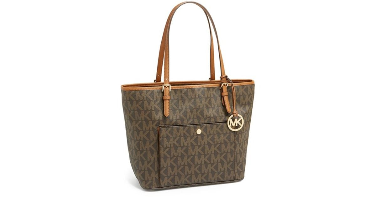 Lyst Michael Kors Large Jet Set Signature Snap Pocket Lyst Michael Kors Large Jet Set Signature Snap Pocket Tote In Brown
