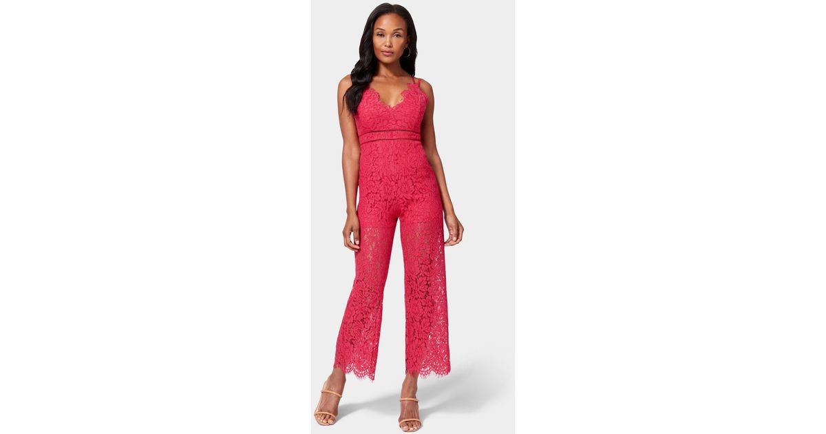 Bebe Strappy Back Lace Jumpsuit in Red | Lyst