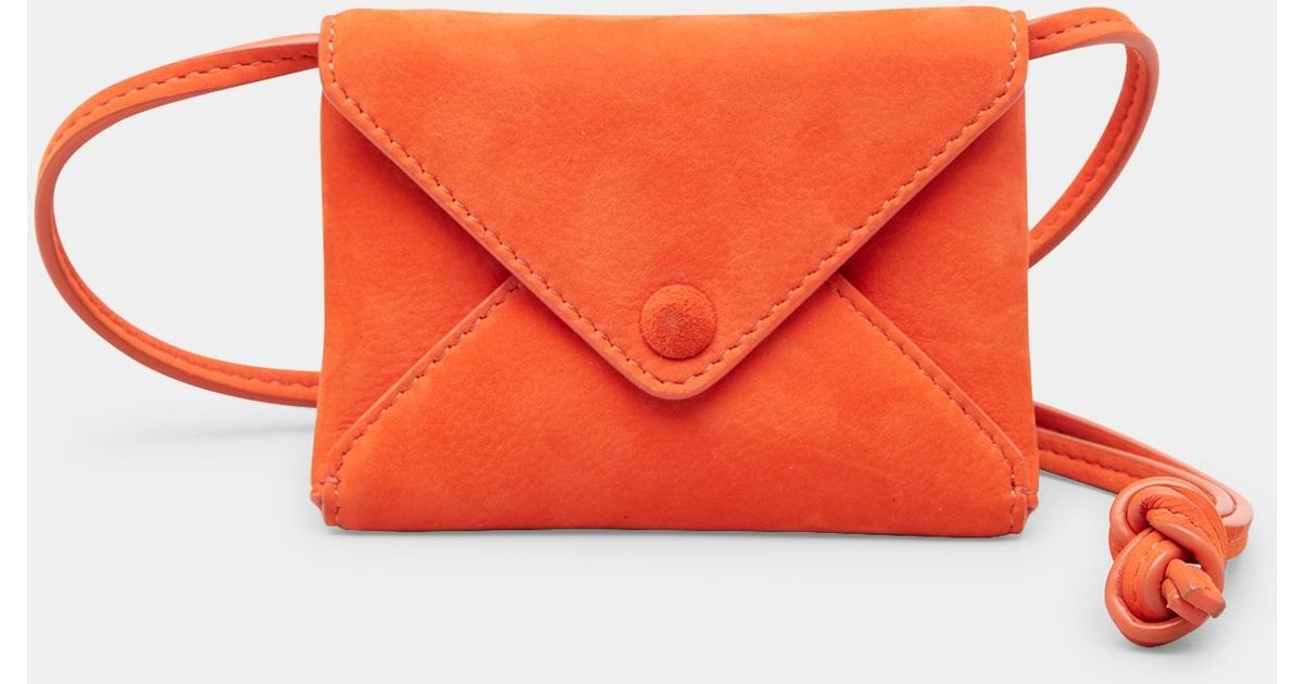 The Row Mini Envelope Flap Crossbody Bag in Orange | Lyst